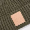 Bonnet en cachemire kaki foncé Bonnet en cachemire kaki foncé