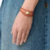 Bracelet Pebble en cuir de veau orange/doré