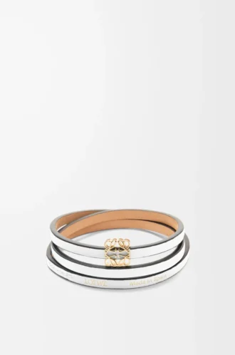 Bracelet rigide Twist en cuir de veau blanc cassé Bracelet rigide Twist en cuir de veau blanc cassé
