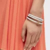 Bracelet rigide Twist en cuir de veau blanc cassé