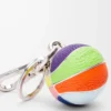 Breloque basket en cuir de veau et métal Multicolore