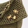Broche sauterelle en laiton doré