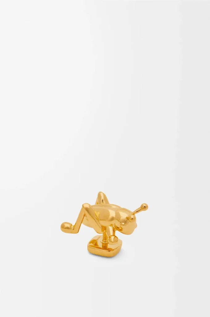 Broche sauterelle en laiton doré