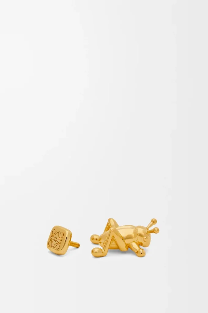Broche sauterelle en laiton doré