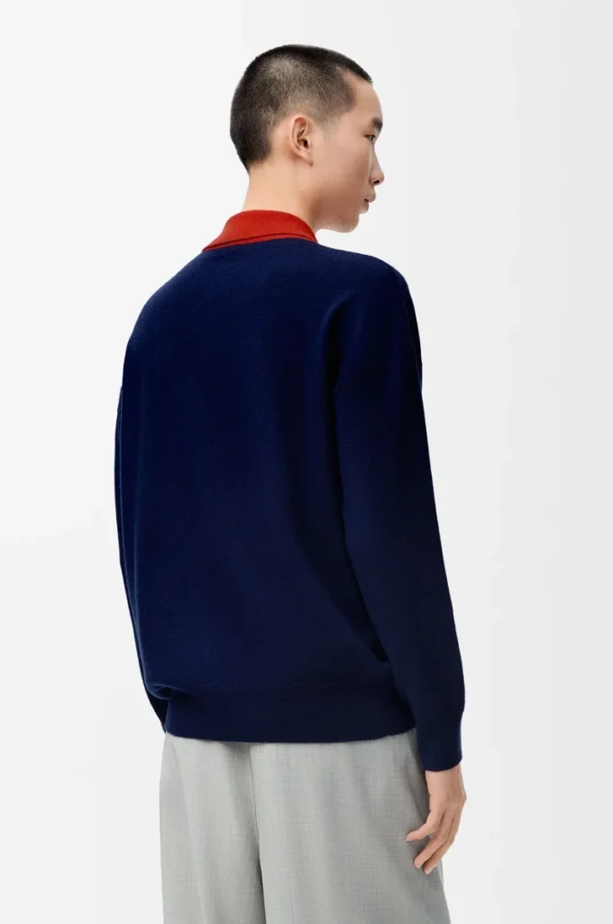 Cardigan polo en laine bleu marine/orange