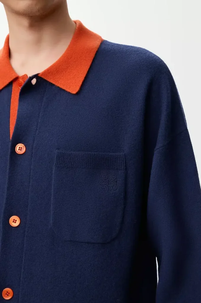 Cardigan polo en laine bleu marine/orange
