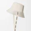 Chapeau de pêcheur en toile blanc cassé Chapeau de pêcheur en toile blanc cassé
