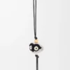 Charm hibou en feutre et cuir de veau gris clair/noir