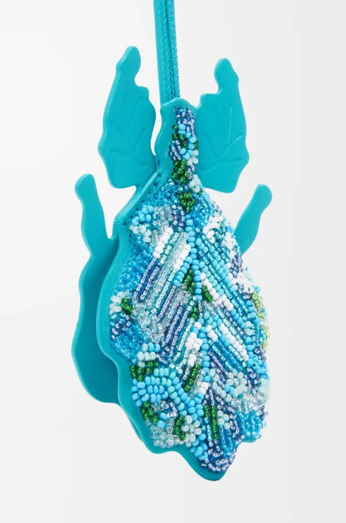 Charm porte-clés insecte feuille en cuir perlé turquoise foncé