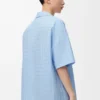 Chemise à manches courtes en coton bleu clair