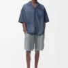 Chemise à manches courtes en coton bleu délavé