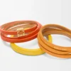 Double bracelet torsadé en cuir de veau Orange vif/Jaune