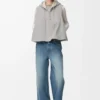 Gilet à capuche en peau lainée gris clair mélangé Gilet à capuche en peau lainée gris clair mélangé