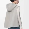 Gilet à capuche en peau lainée gris clair mélangé Gilet à capuche en peau lainée gris clair mélangé