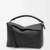 Grand sac Puzzle Edge en cuir de veau grainé noir