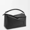 Grand sac Puzzle Edge en cuir de veau grainé noir