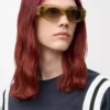 Lunettes de soleil ovales Maxi Anagram biseautées Transparent Olive