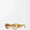 Lunettes de soleil ovales Maxi Anagram biseautées Transparent Olive