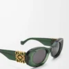 Lunettes de soleil ovales Maxi Anagram à bords biseautés vert foncé