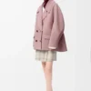 Manteau court en laine rose