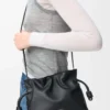 Mini pochette Flamenco en cuir de veau nappa noir