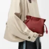 Mini pochette Flamenco en cuir de veau nappa rouge brûlé