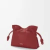 Mini pochette Flamenco en cuir de veau nappa rouge brûlé