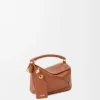 Mini sac Featherlight Puzzle en cuir d&rsquo;agneau nappa Pecan