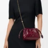 Mini sac à main Flamenco en anguille bordeaux