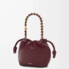 Mini sac à main Flamenco en cuir d&rsquo;agneau nappa souple, couleur bordeaux foncé