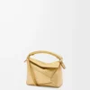 Mini sac Puzzle Edge en cuir d&rsquo;agneau laminé doré