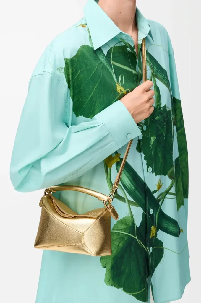 Mini sac Puzzle Edge en cuir d&rsquo;agneau laminé doré
