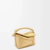 Mini sac Puzzle Edge en cuir d&rsquo;agneau laminé doré