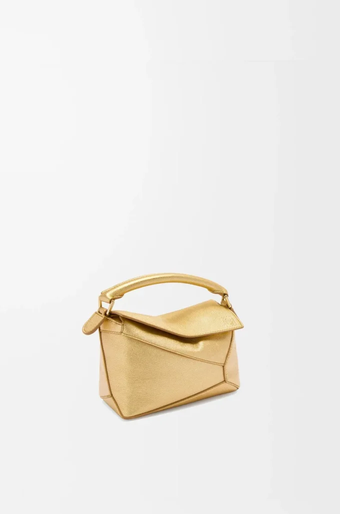 Mini sac Puzzle Edge en cuir d&rsquo;agneau laminé doré