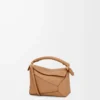 Mini sac Puzzle Edge en cuir de veau grainé souple couleur caramel