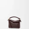 Mini sac Puzzle Edge en cuir de veau grainé souple Dark Chestnut