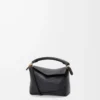 Mini sac Puzzle Edge en cuir de veau grainé souple noir