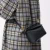 Mini sac Puzzle Edge en cuir de veau grainé souple noir
