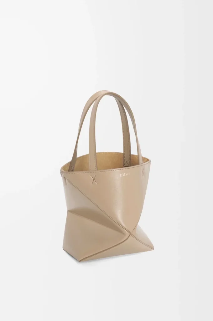 Mini sac Puzzle Fold en cuir de veau brillant Sand Mini sac Puzzle Fold en cuir de veau brillant Sand
