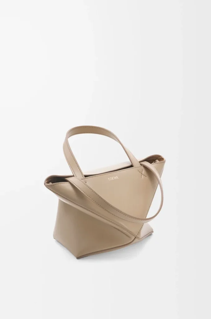 Mini sac Puzzle Fold en cuir de veau brillant Sand Mini sac Puzzle Fold en cuir de veau brillant Sand