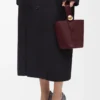 Mini sac seau Pebble en cuir de veau lisse Dark Burgundy Mini sac seau Pebble en cuir de veau lisse Dark Burgundy