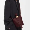 Mini sac seau Pebble en cuir de veau lisse Dark Burgundy Mini sac seau Pebble en cuir de veau lisse Dark Burgundy