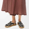 Mules à rivets en cuir de veau velours Noir/Blanc