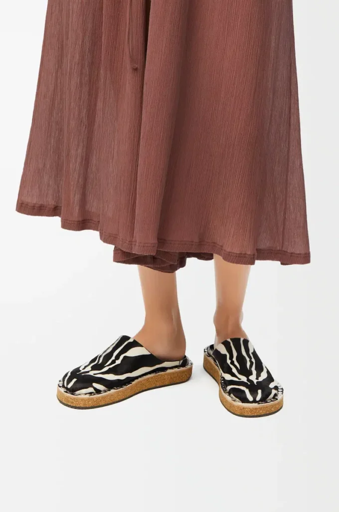 Mules à rivets en cuir de veau velours Noir/Blanc