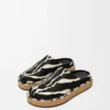 Mules à rivets en cuir de veau velours Noir/Blanc
