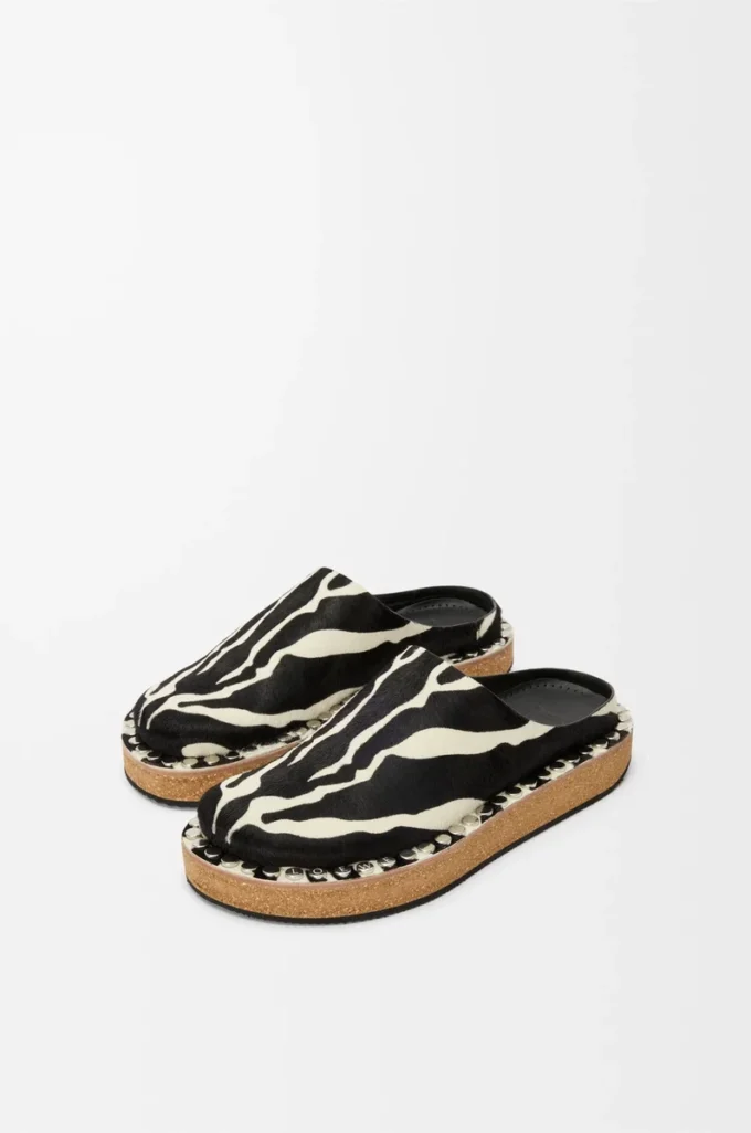 Mules à rivets en cuir de veau velours Noir/Blanc