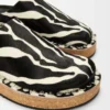 Mules à rivets en cuir de veau velours Noir/Blanc