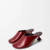 Mules Toy en cuir d&rsquo;agneau verni souple rouge foncé