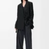 Veste drapée en laine noire