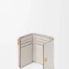 Petit portefeuille vertical Anagram en cuir de veau grainé Light Ghost Grey